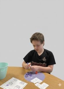 Autistic child who struggles with autistic emotional regulation sitting at school desk